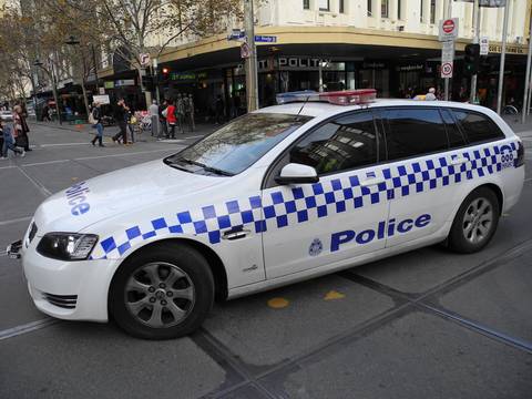 File image: Australian police car parked on a busy city street