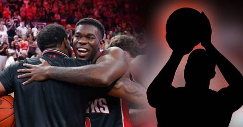 Darius Days. Hawks player celebrating at arena with crowd visible in background