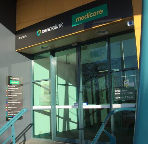 Centrelink and Medicare office storefront with service hours displayed