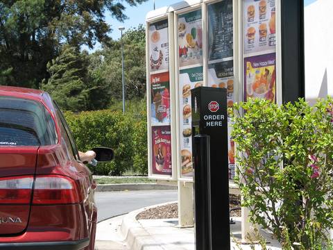 File image: Drive-thru ordering station with menu display and order speaker post