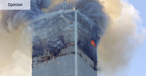 North Tower of World Trade Center engulfed in smoke and flames during September 11 attack.