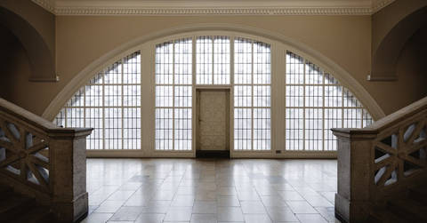 File image: Grand arched institutional interior with gridded skylight and symmetrical stone pillars