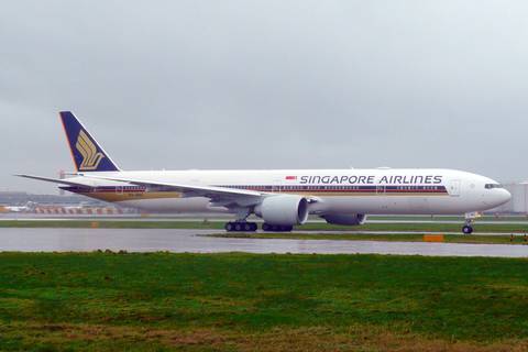 File image: A Singapore Airlines Boeing 777-300ER on a wet taxiway at London Heathrow