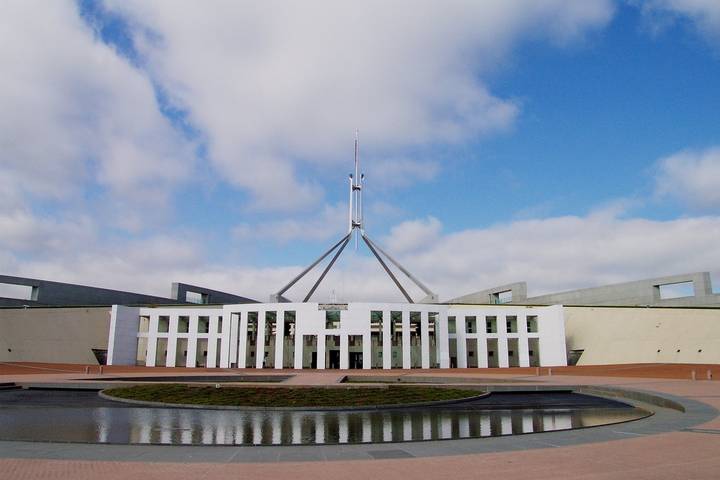 File image: Parliament House Canberra with reflecting pool and pyramidal roof