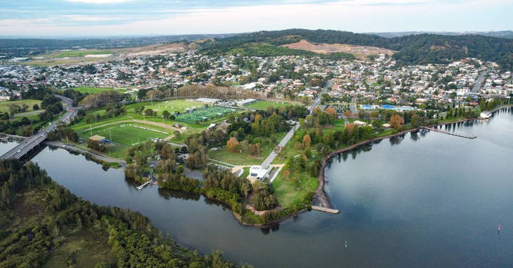File image: Aerial view of Australian lakeside suburb with sports fields and hills