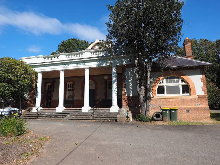 File image: Neoclassical courthouse with white columns and brick annexe