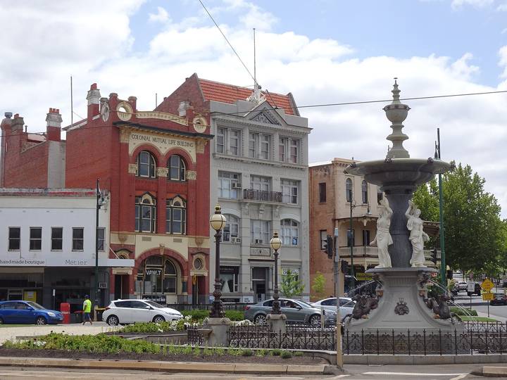 File image: Bendigo street with heritage buildings, fountain, parked cars, daytime