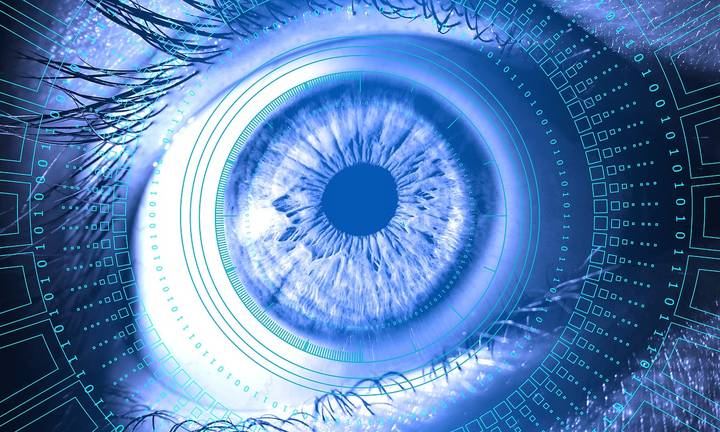 File image: Blue glowing digital eye with technology and circuit patterns