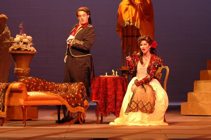 File image: Actors in period costume performing on ornate theatre stage