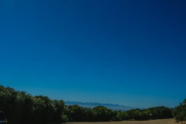 File image: Clear blue sky over scrubland with distant mountain silhouette