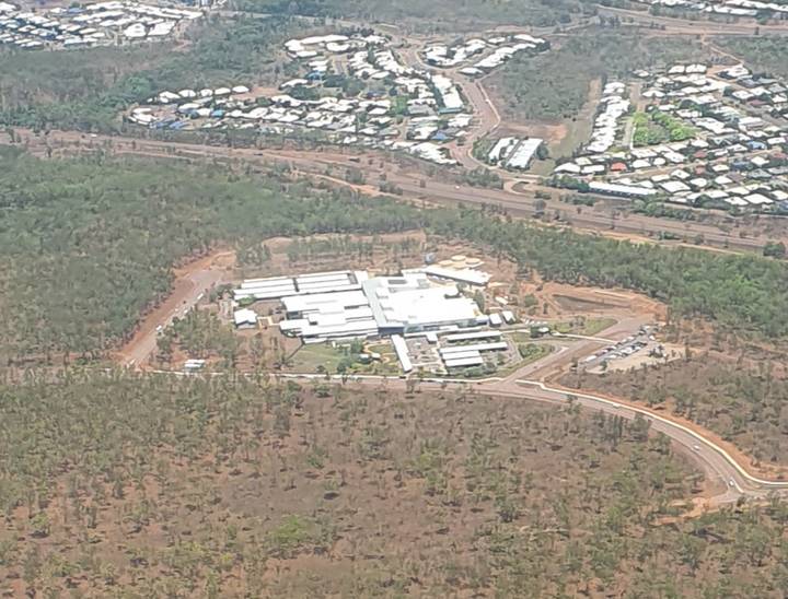 File image: Aerial view of large institutional building complex in Australian scrubland