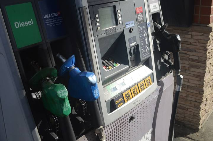 File image: Contemporary fuel pump display with green diesel pump and payment interface at petrol station.