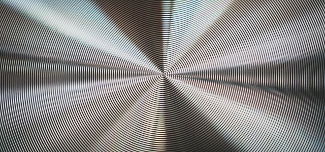 a black and white photo of a circular object