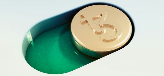 a can of soda sitting on top of a green container