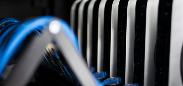 a close up of a bunch of wires in a rack