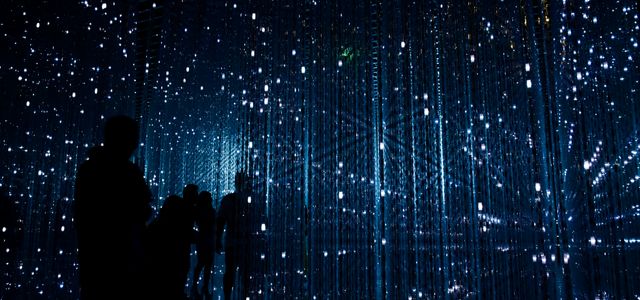 a group of people standing next to each other