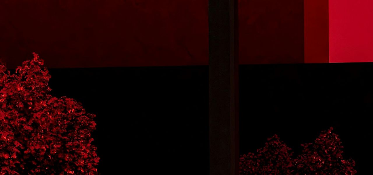 a group of vases sit on a shelf