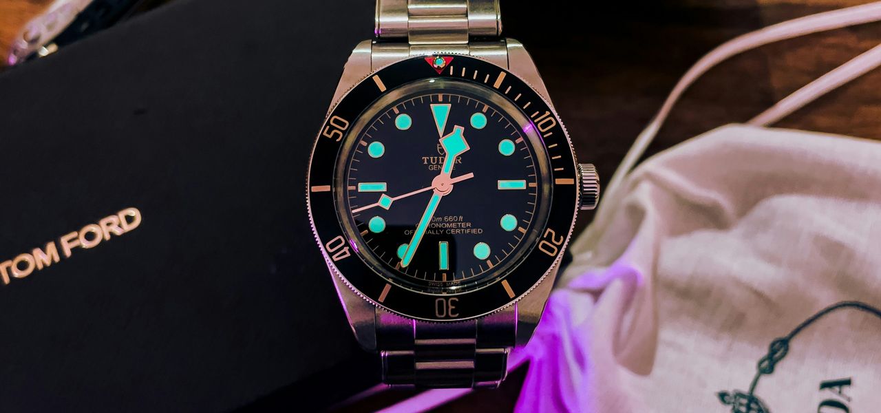 black and silver analog watch