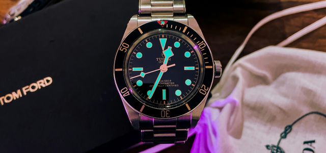 black and silver analog watch