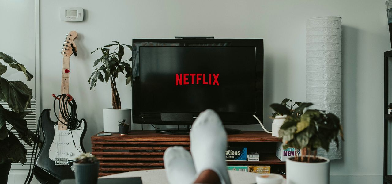 black flat screen tv turned on displaying 11