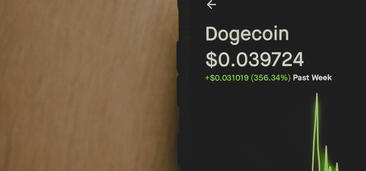 black iphone on brown wooden table