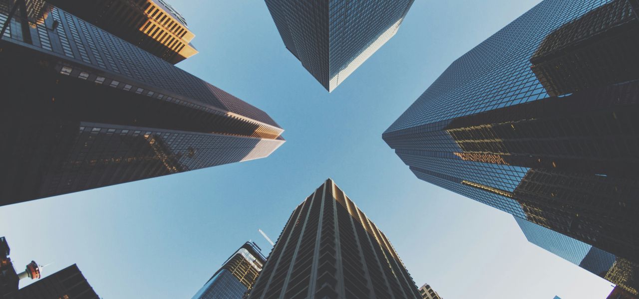 blue and black city buildings photography