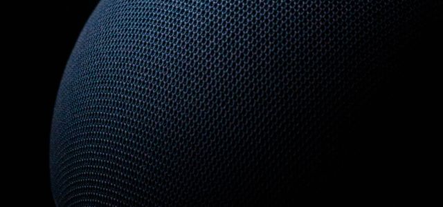 blue round textile on black background