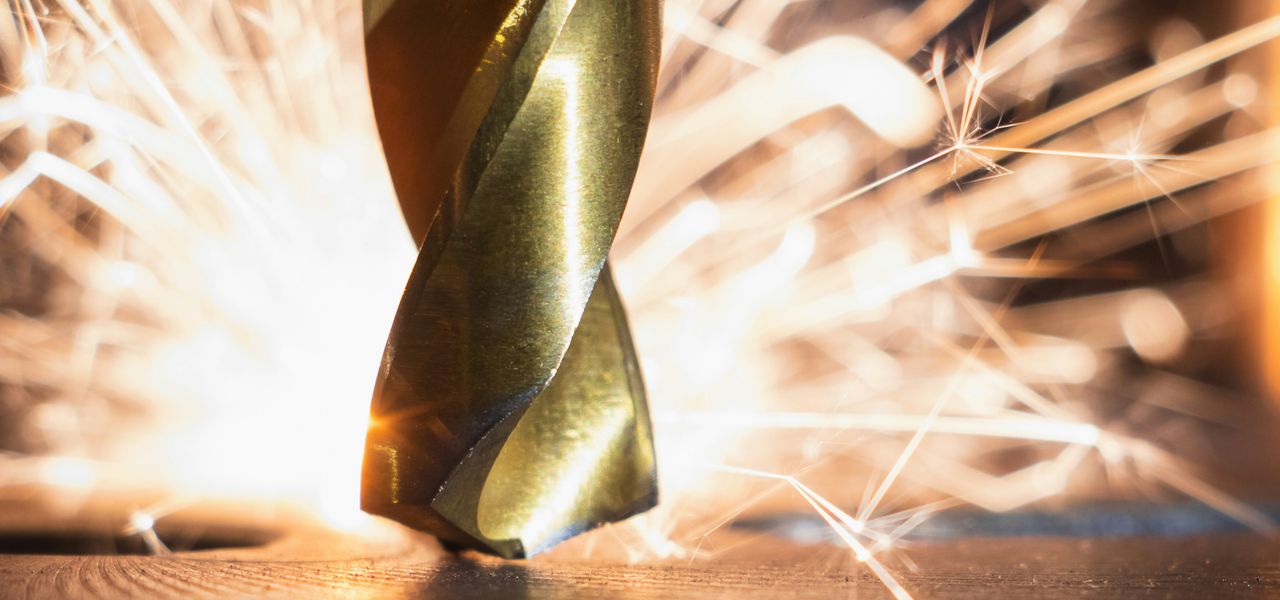 brown and green textile on brown wooden table