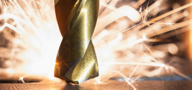 brown and green textile on brown wooden table