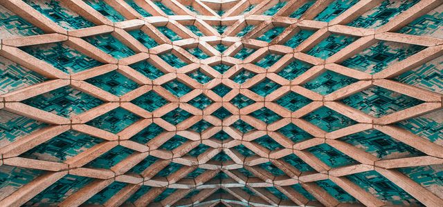 brown and white building under blue sky