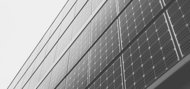 close-up photography of black and gray concrete building