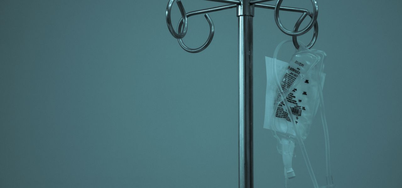 dextrose hanging on stainless steel IV stand