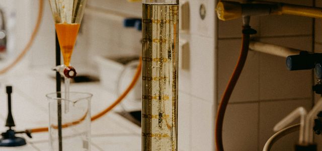 gold and blue trophy on white table