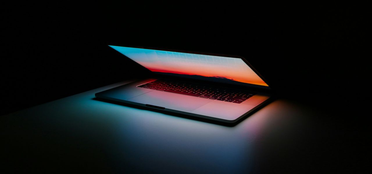 gray and black laptop computer on surface