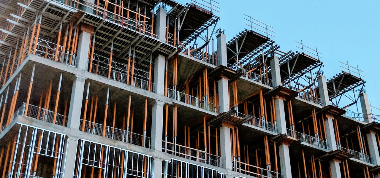 gray concrete building under construction