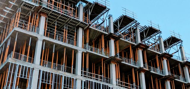 gray concrete building under construction