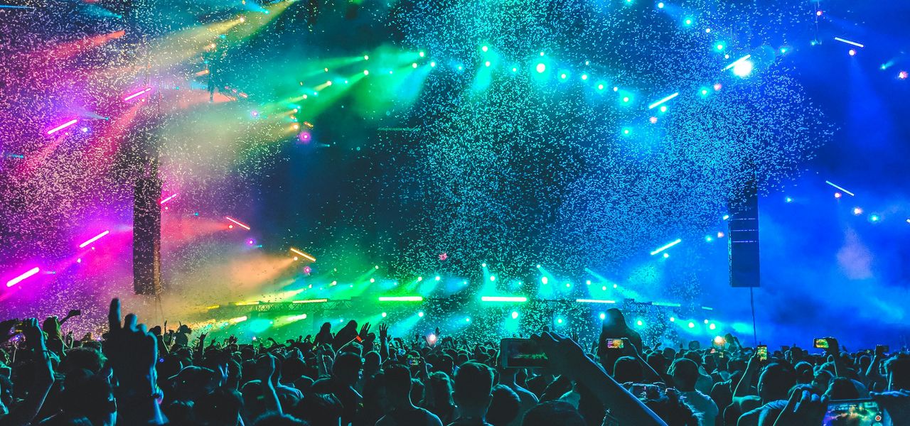 group of people in front of stage