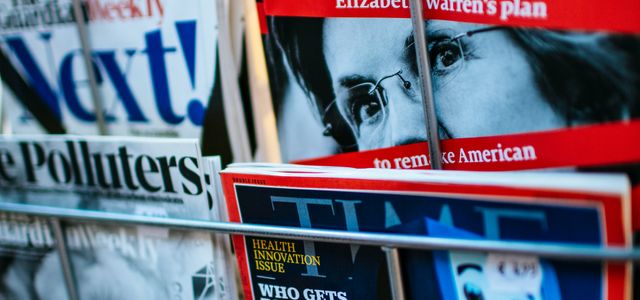 magazines displayed on a rack