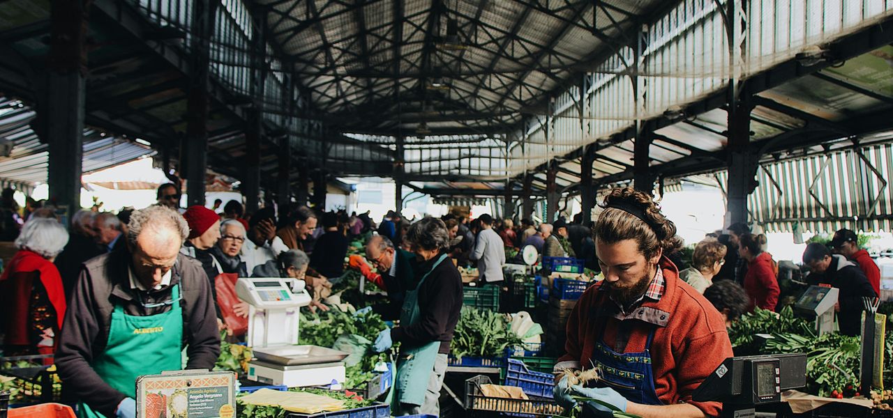 man sitting near the vegetable