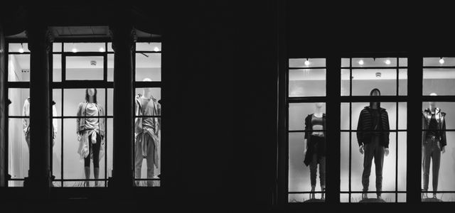 mannequin in front of windows