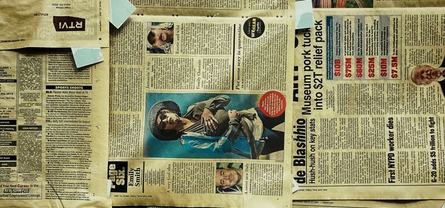 newspaper on brown wooden table