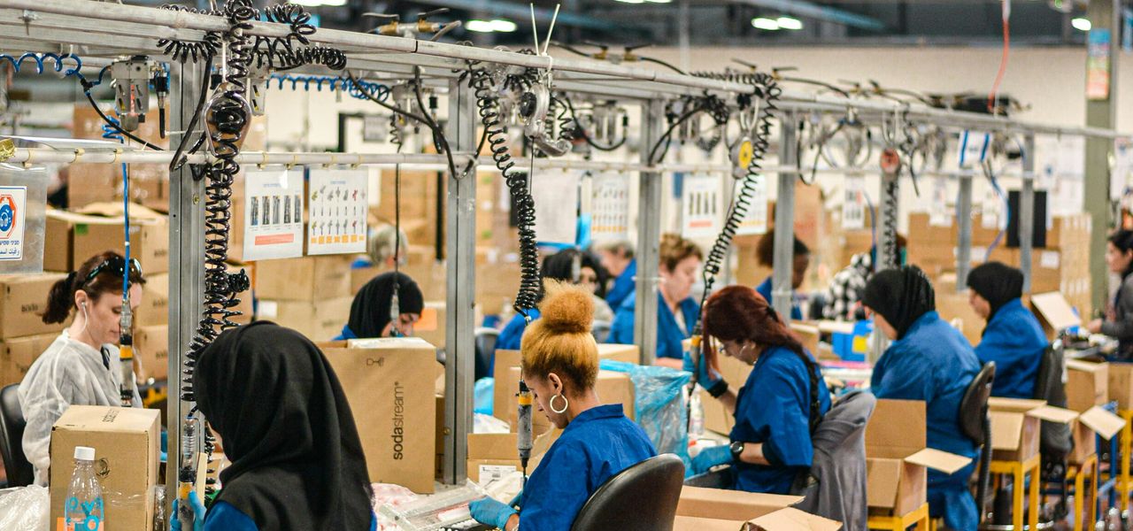 people sitting on chair inside room