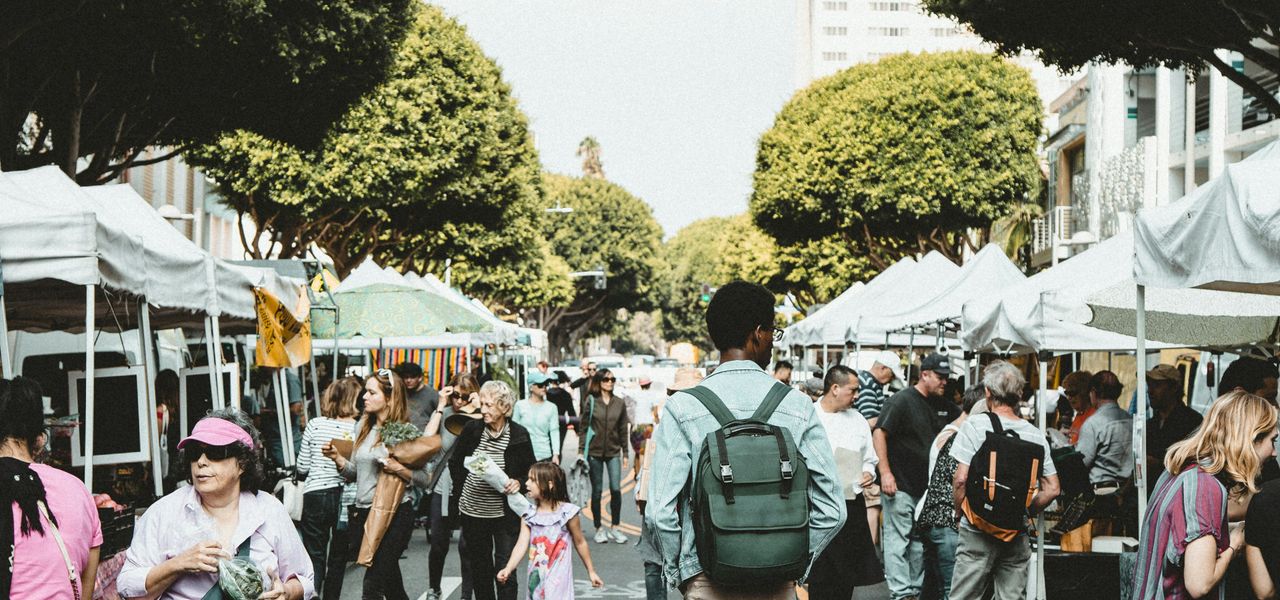 people walking on walkway during daytime