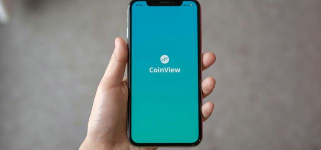 person holding space gray iPhone X