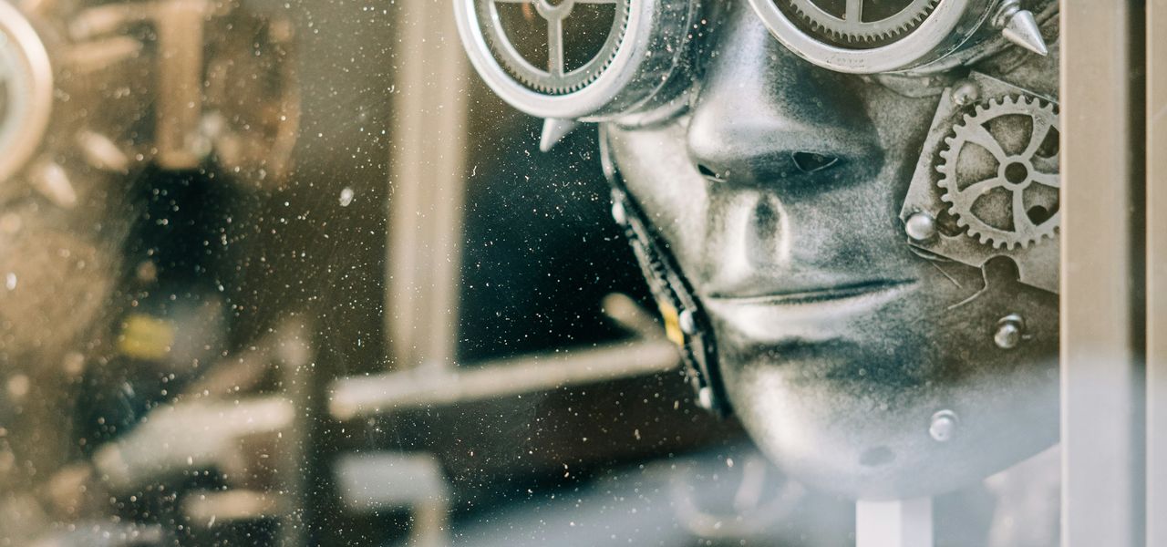 person wearing gas mask in grayscale photography