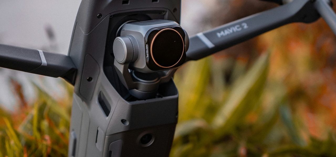 selective focus photography of black DJI Mavic 2 on ground