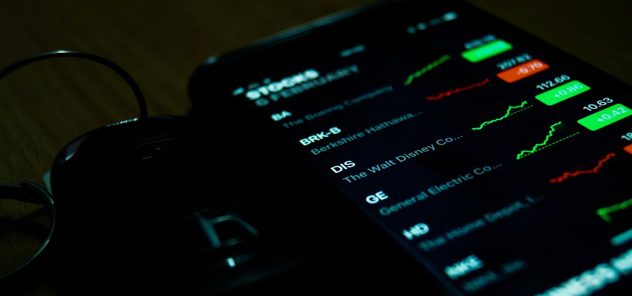 smartphone on brown wooden surface