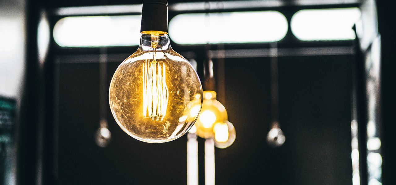 tilt shift lens photography of clear glass bulb