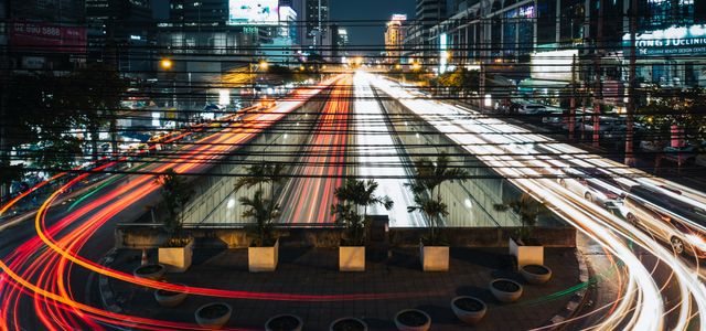 time lapse photography of cars on road during night time