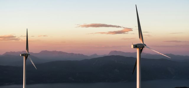 two white wind turbines